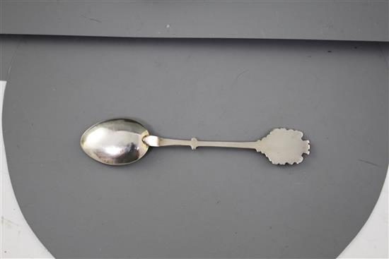 Six white metal and enamel teaspoons, decorated with Nairobi safari scenes with animals, unmarked, 11.2cm, gross 2.9oz.